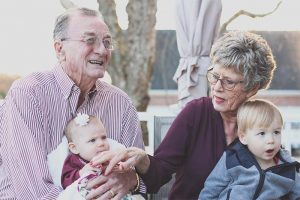 grandparents with their grandchildren after winning custody